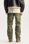 P051 Overdye Carpenter denim in mid rise, relaxed fit with hidden side snaps and hammer loop.