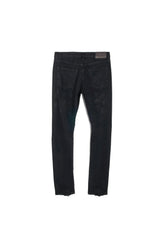 P001 low rise skinny jeans in black oil spill with five pocket styling and button fly closure