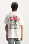 Videoclub Tee in textured jersey with crackle print, available in sizes XS to 3XL.
