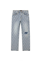The PURPLE BRAND P011 Jacquard Monogram features light blue straight leg jeans with a jacquard monogram geometric pattern, five-pocket design, and a distressed rip on the right knee, shown against a white background.