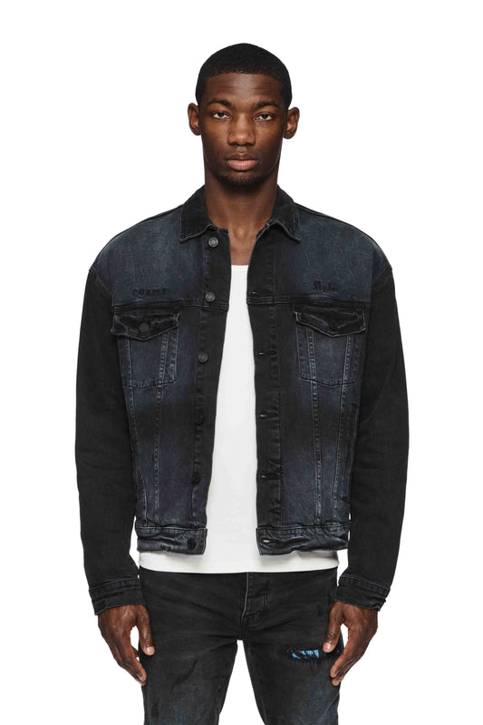 Purple X Blue Sky oversized trucker jacket in faded black denim with back graphic and chest logo.