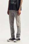P005 Vintage Haze denim 28-42, stretch mid-rise slim straight with silver foil strip detail.