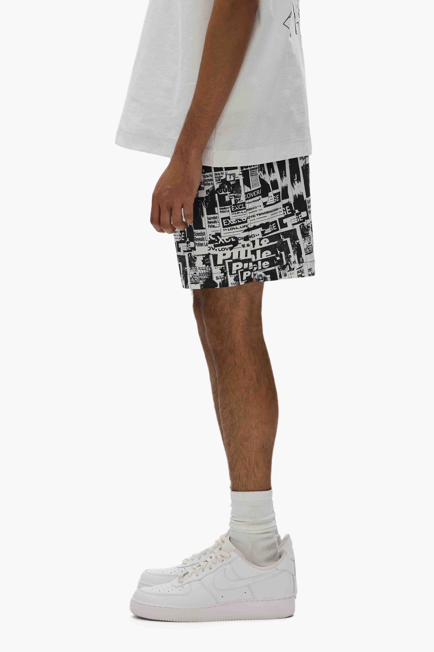 Tabloid Swim Shorts