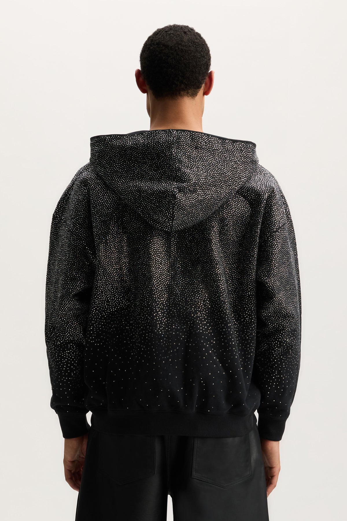 Sparkely hoodie in cotton fleece with hotfix and embroidery crystal fade detail.