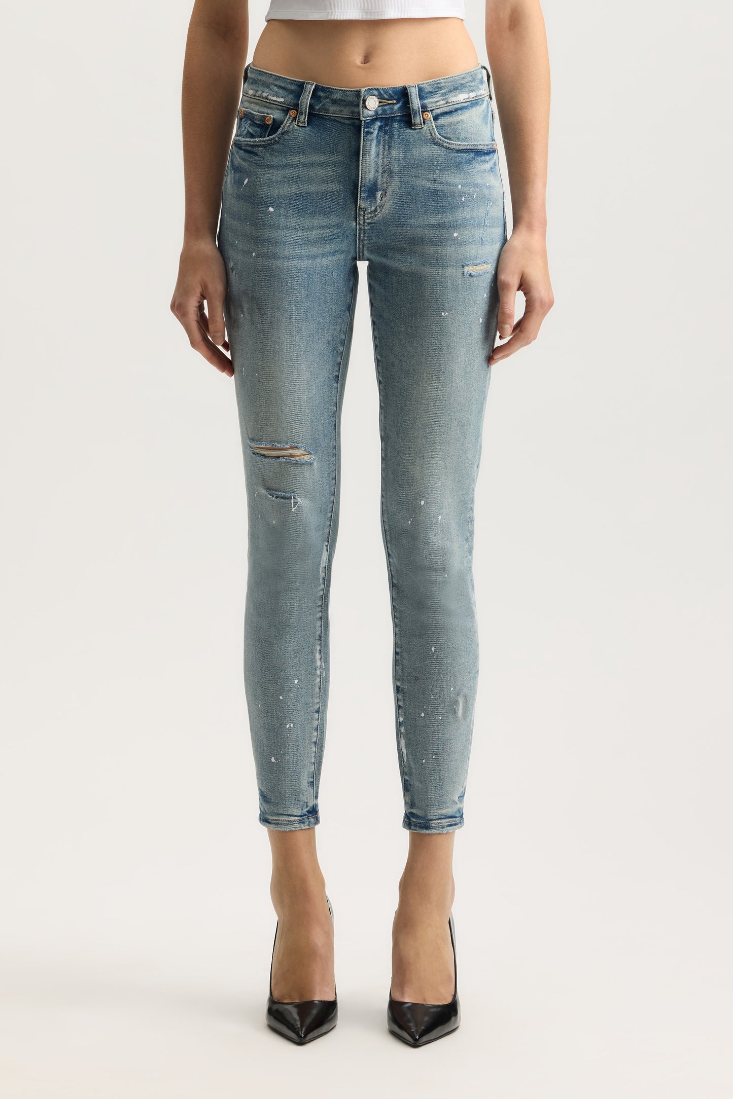 Mid Rise Skinny Denim with Paint Splatters, Ankle Length, available in sizes 24-34.