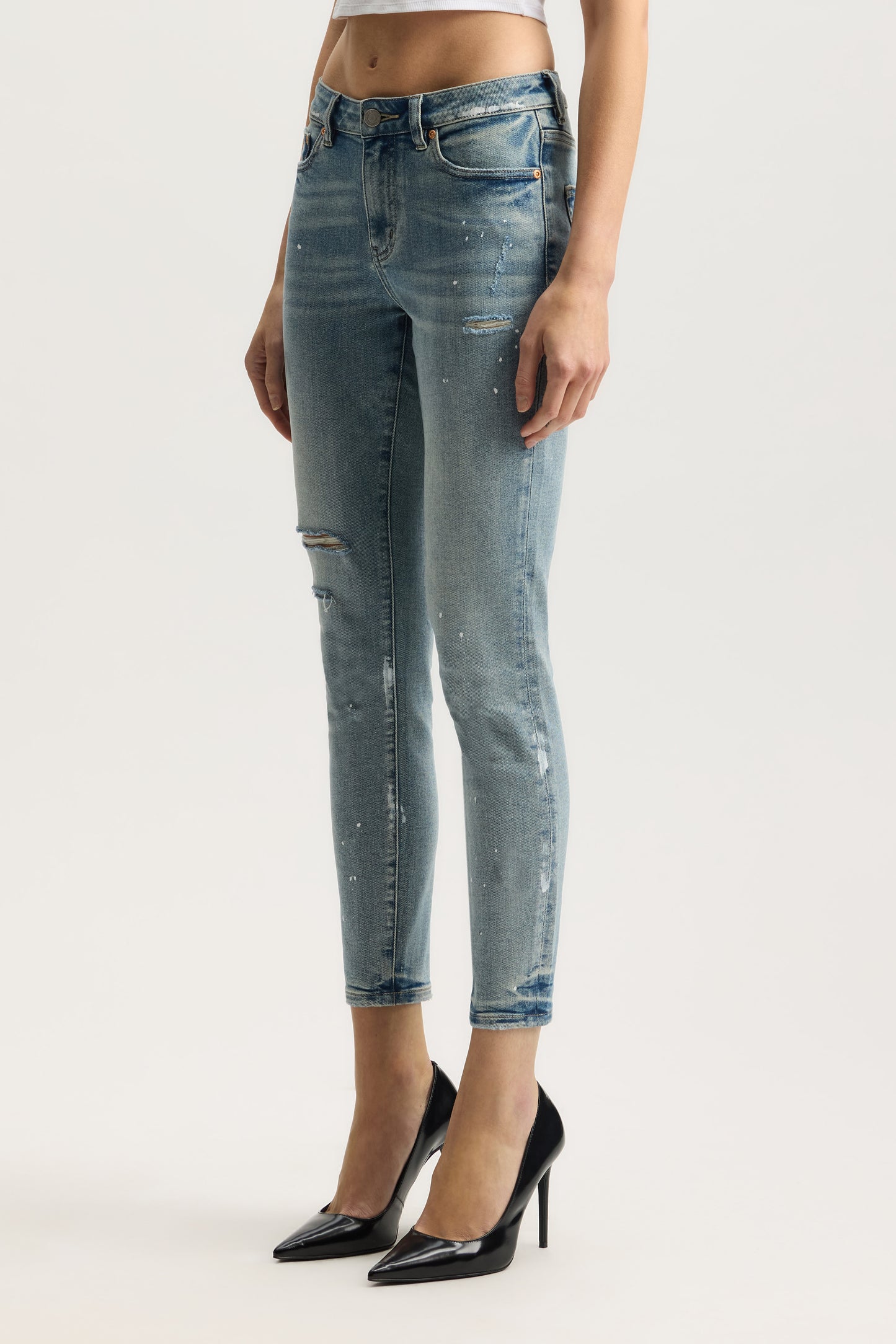 Mid Rise Skinny Denim with Paint Splatters, Ankle Length, available in sizes 24-34.
