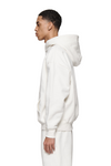 Blank Hoodie in oversized fit, heavyweight fleece knit with dropped shoulder design.