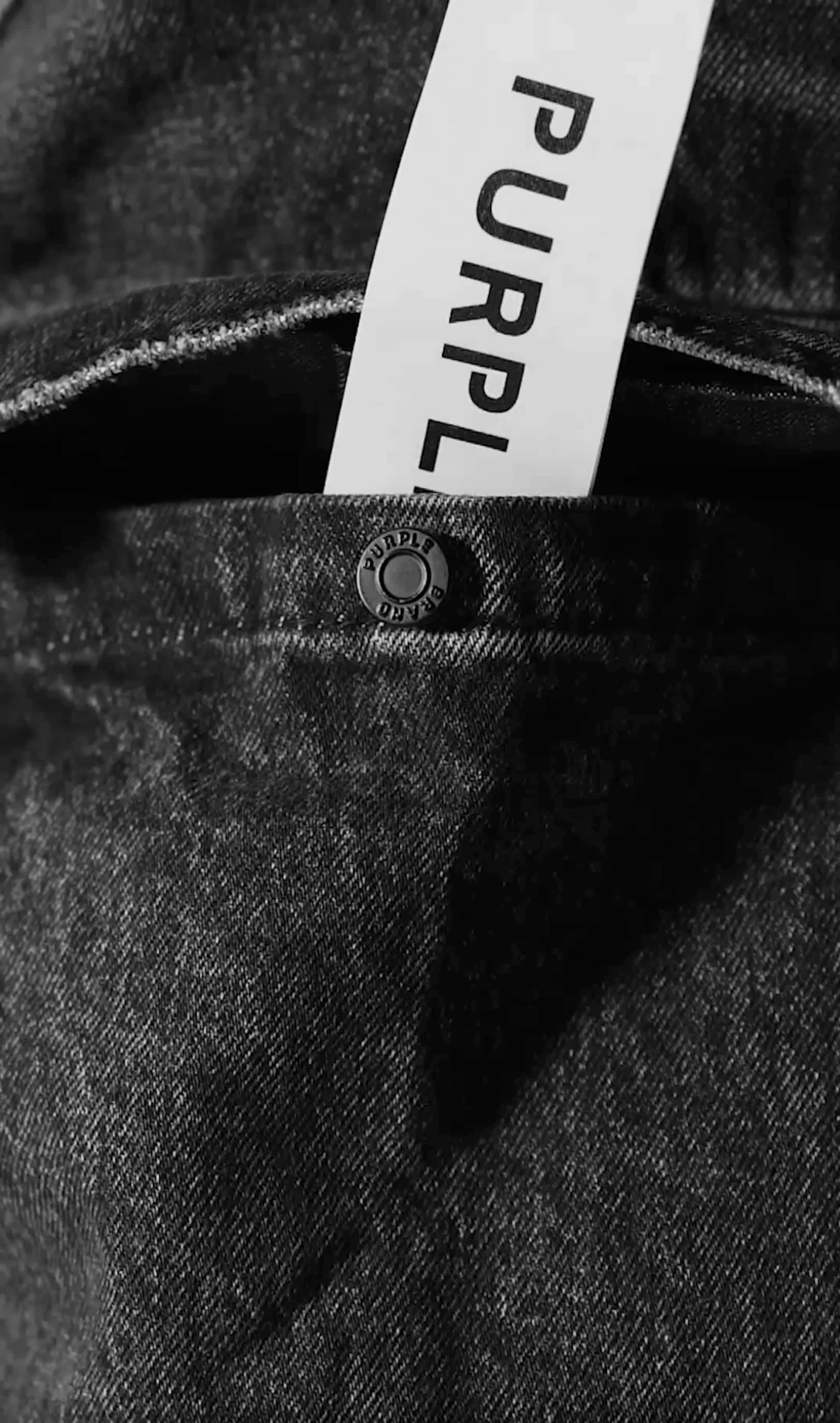 Fashion jeans with black tag on back pocket