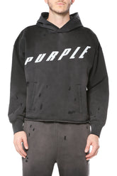 Oversized white sweatshirt with acid wash distress and white crystals fine rocks detail.