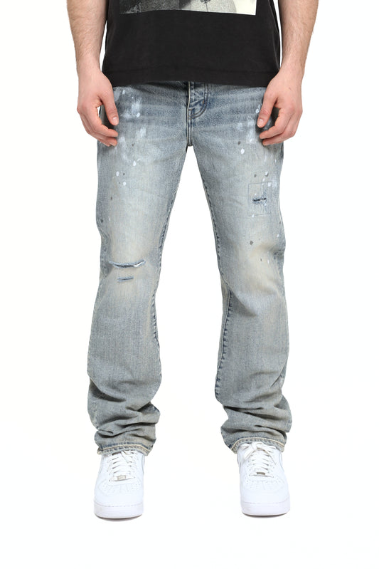 Light Vintage Slash Paint Denim with Knee Slit and Paint Splatters, available in sizes 28-40.