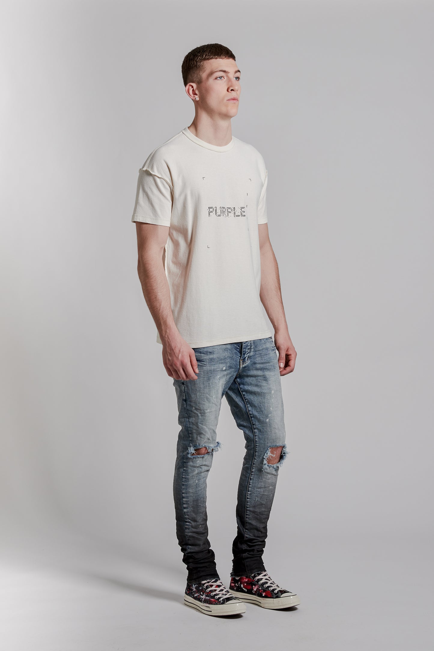 PURPLE BRAND - Men's Denim Jean - Low Rise Skinny - Style No. P001 - Indigo Black Gradient - Model Side Pose