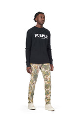 PURPLE BRAND - Men's Denim Jean - Low Rise Skinny - Style No. P001 - Washed Camo Tan Snake - Model Side Pose