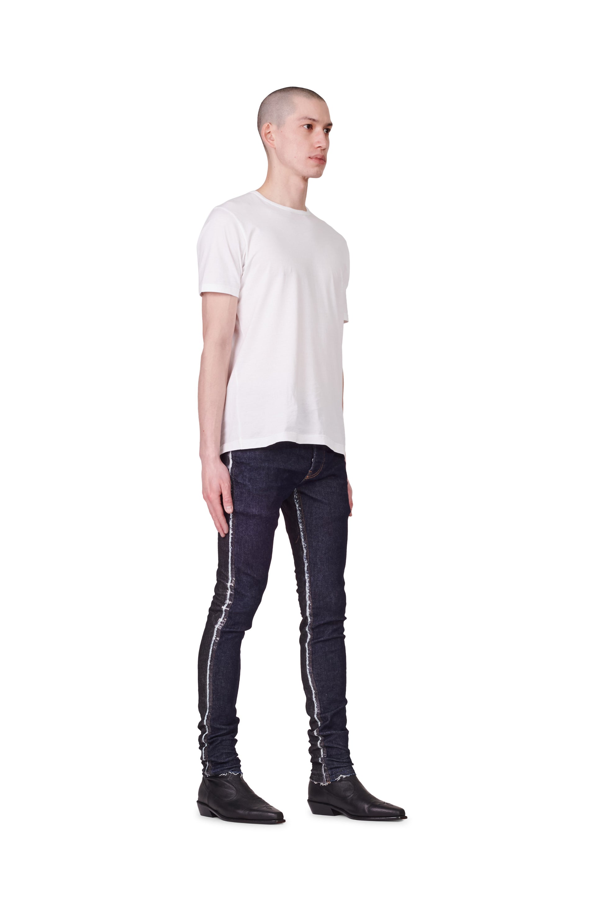 PURPLE BRAND - Men's Low Rise Skinny Jean - Style No. P001 - Raw Indigo Black Framis Fray - Model Side Pose