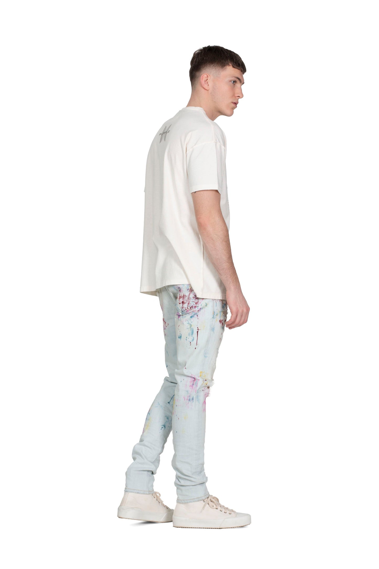 PURPLE BRAND - Men's Denim Jean - Low Rise Skinny - Style No. P001 - Faded Blowout Paint - Model Styled Pose