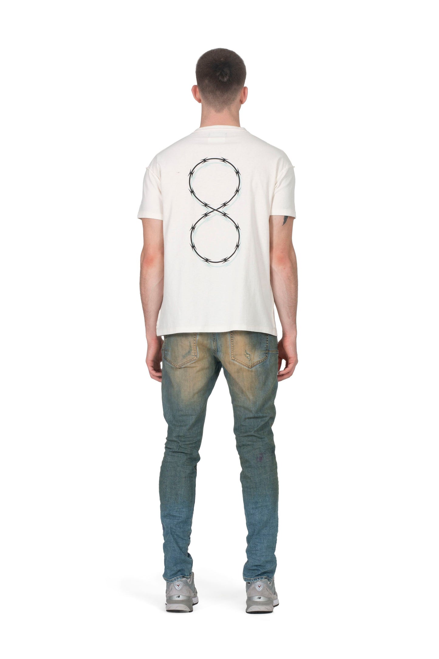 PURPLE BRAND - Men's Denim Jean - Mid Rise Slim - Style No. P002 - Mid Blue Patched - Model Back Pose